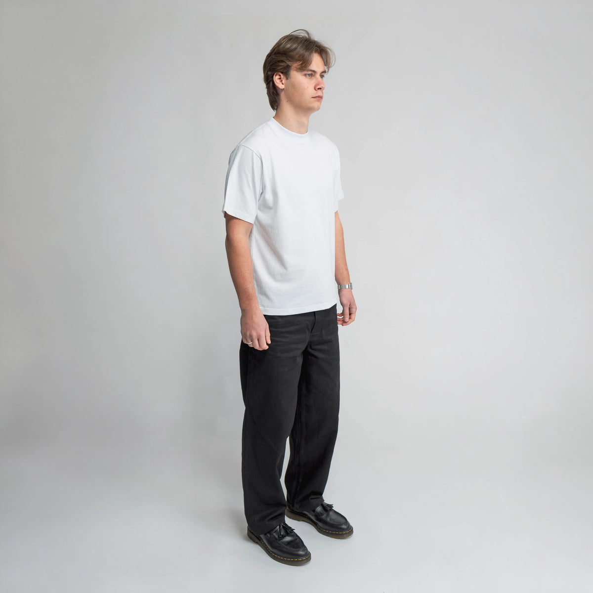 Anderson Relaxed T-Shirt in white, side view showing relaxed fit
