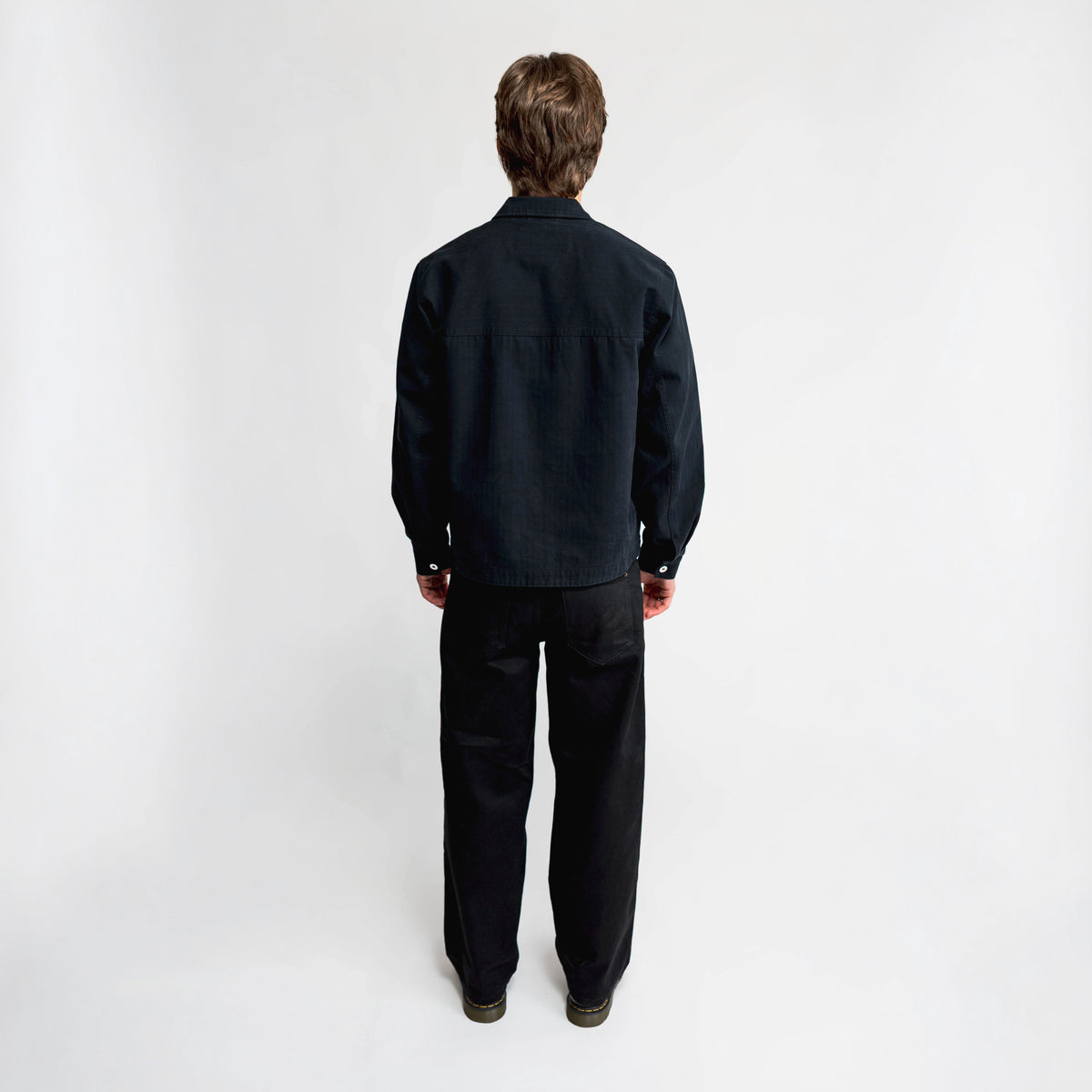Anderson Chore Coat in black, back view with back yoke