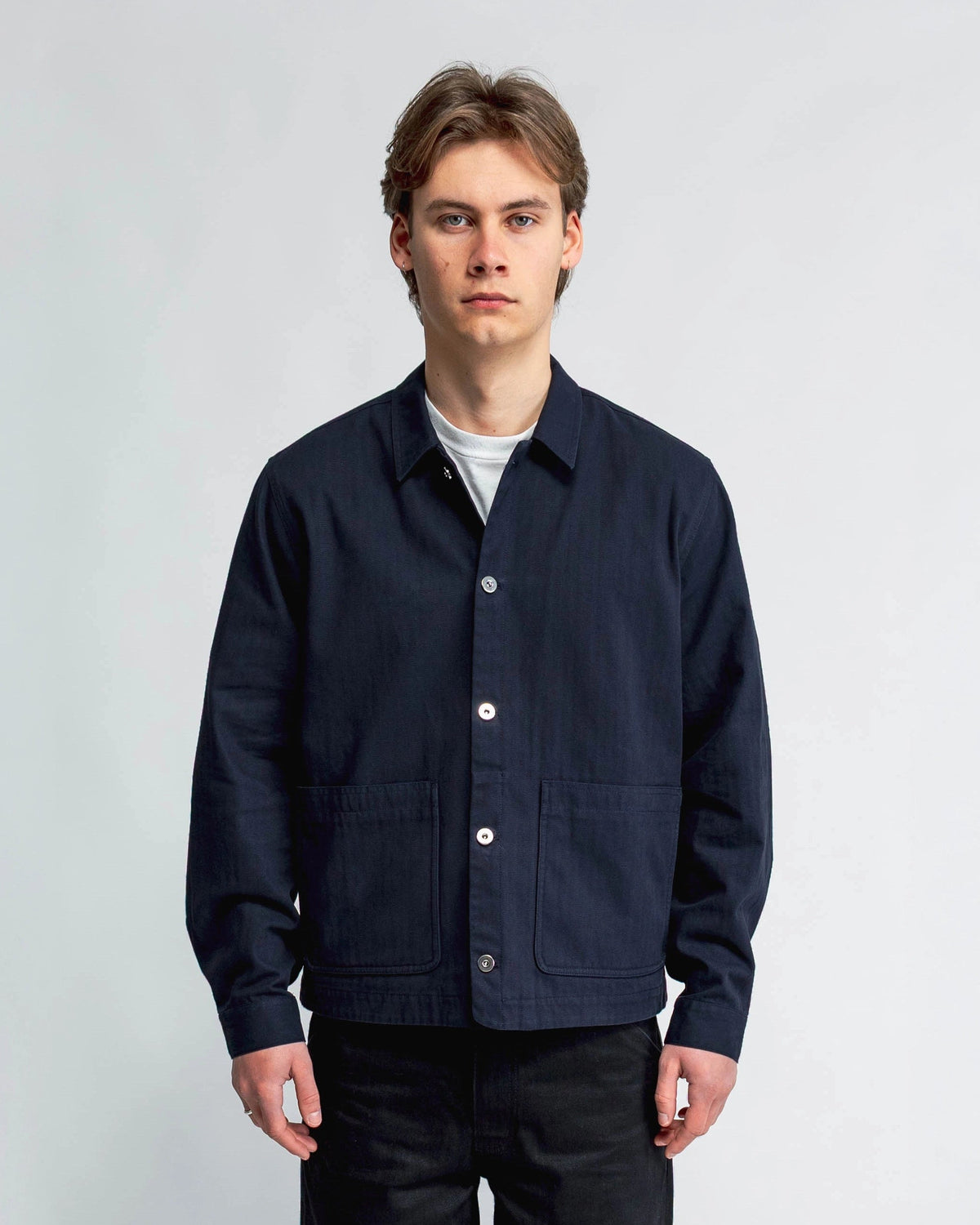 Anderson Chore Coat in navy, front view — 300gsm cotton herringbone twill