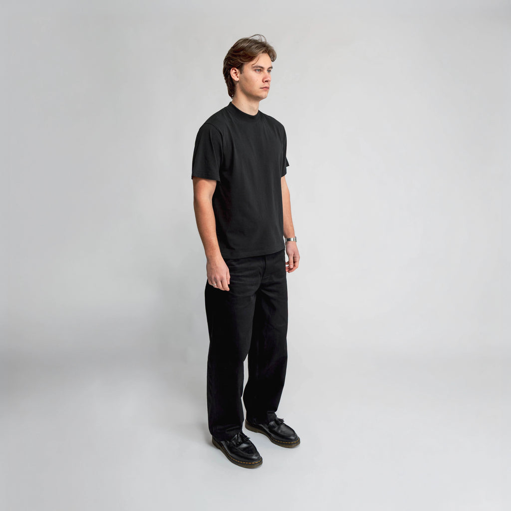 Anderson Relaxed T-Shirt in black, side view showing relaxed fit