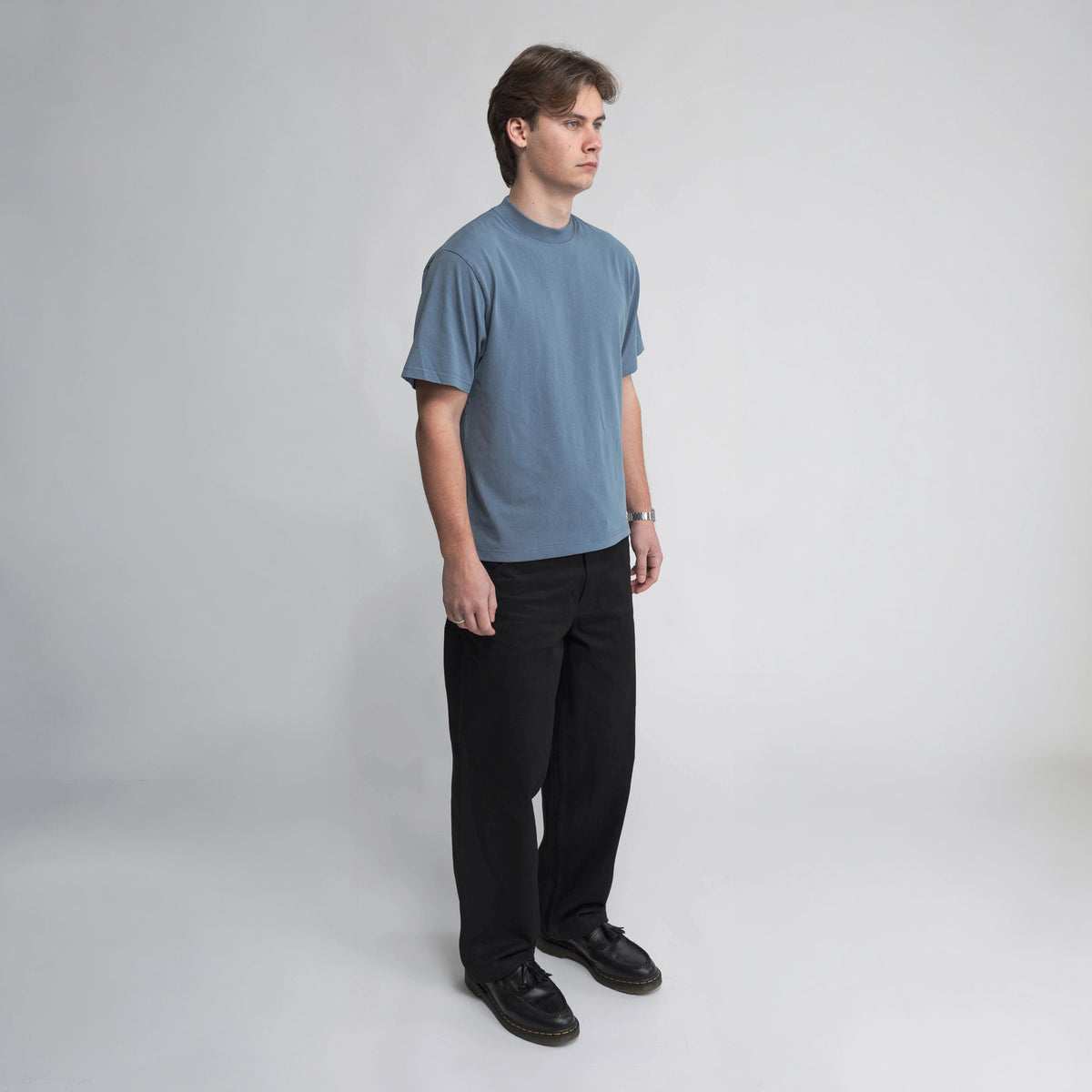 Anderson Relaxed T-Shirt in blue, side view showing relaxed fit
